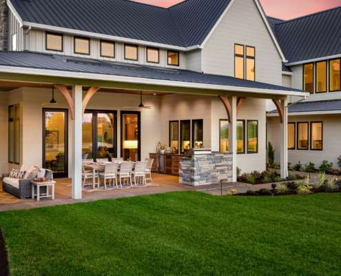 Renovated outdoor patio kitchen on nice grass lot